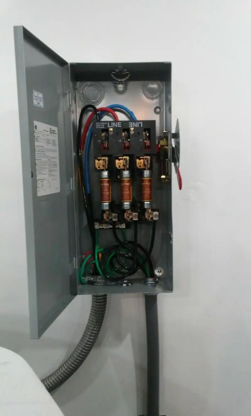 Three-phase disconnect switch installed for Smoke Detector Installation in Sweeny